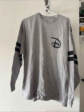 Disney Gray Long Sleeve Spirit Jersey with Black Logo and Sleeve Stripes